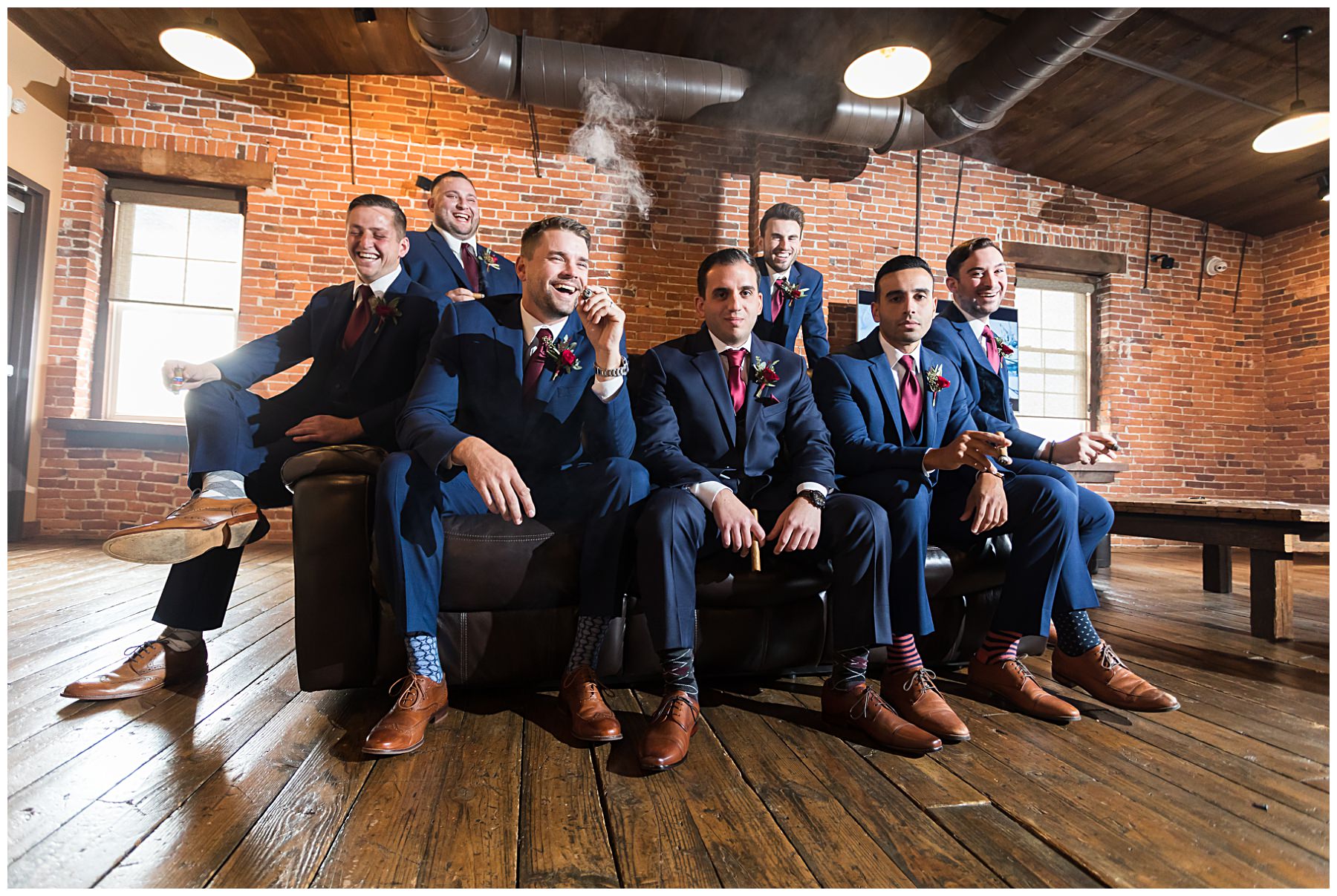 groomsmen portrait with cigars