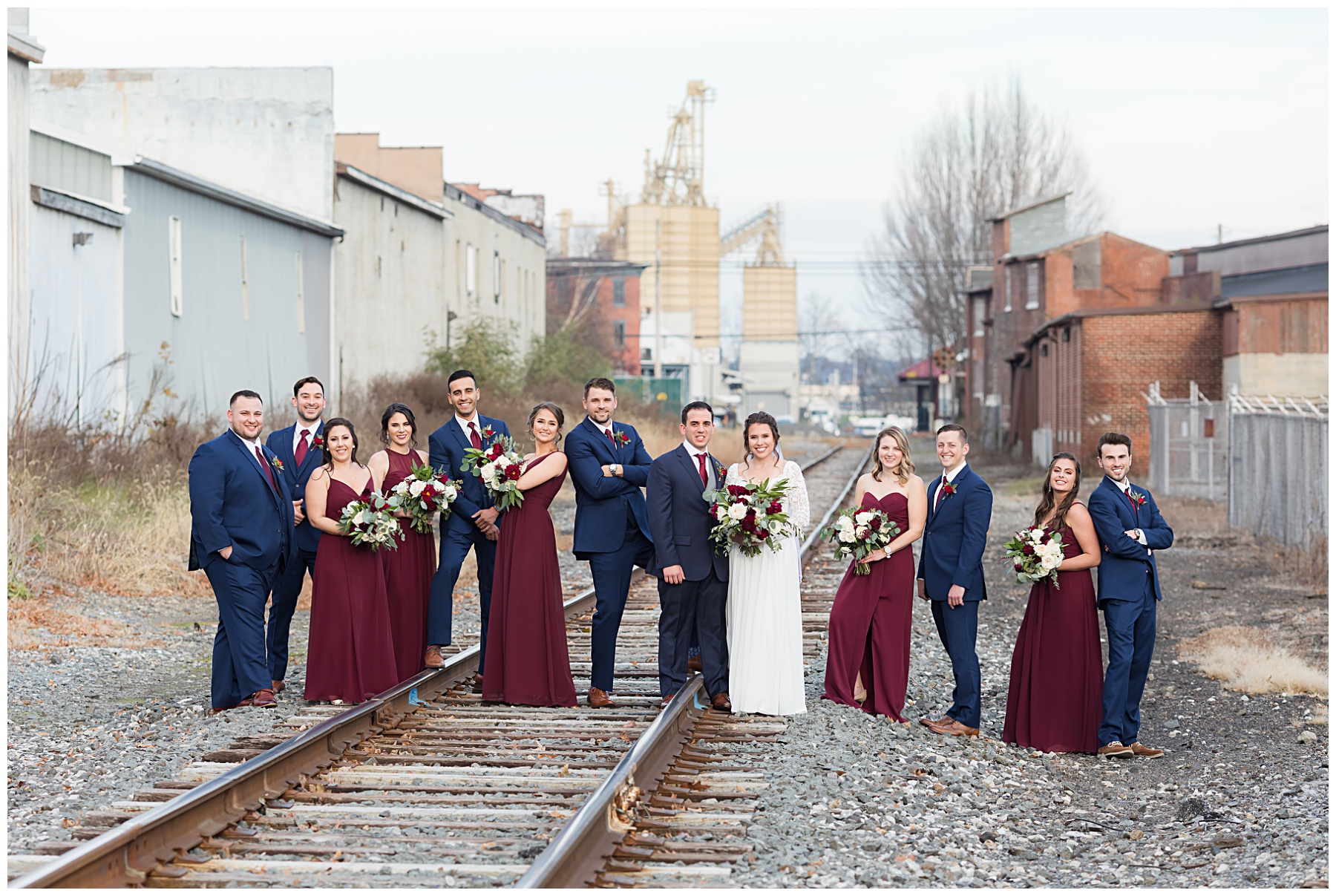 bridal party on train tracks
